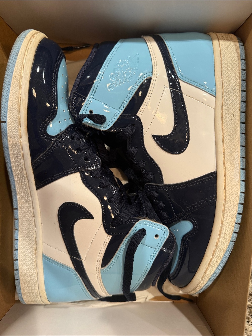 UNC Air Jordan 1 retro high top sneakers (womens)